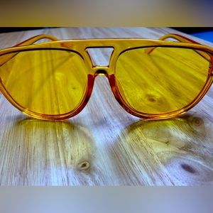 Yellow lucite aviator sunglasses. Beautiful hued mustard yellow. Nice fit.